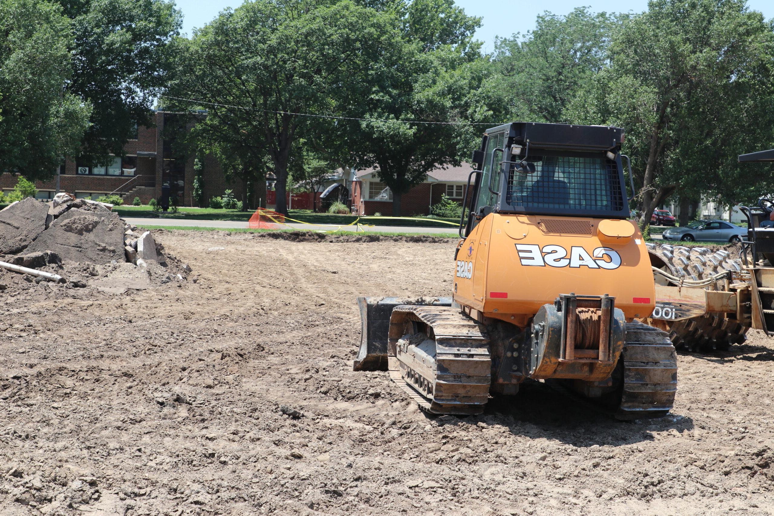 Work on ground for new parking lot